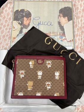 Gucci GG LE Supreme Doraemon Wristlet Pouch in Brown & Burgundy -
